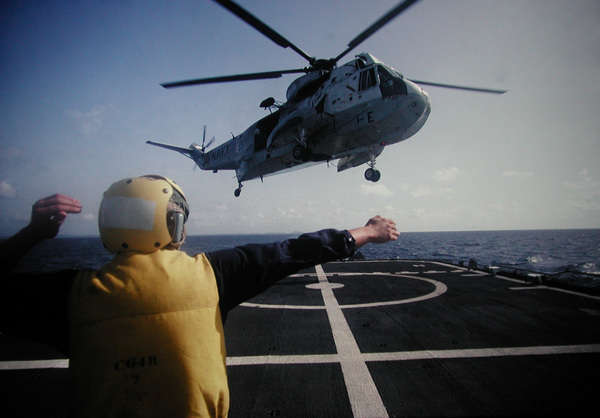 Navy SH-3 lifts away, USS Yorktown--somewhere in the Caribbean